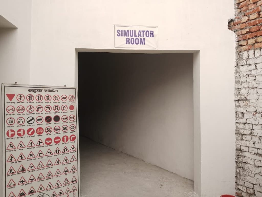 Simulator room entrance with road signs board